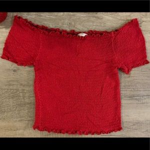 Off shoulder red woman’s top